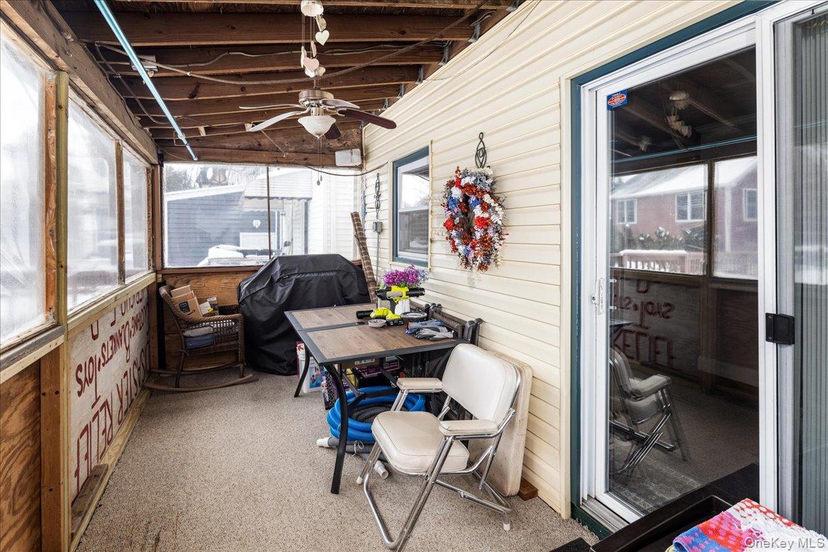 170 Birch Hill Road Locust Valley, NY 11560 - Photo 22 of 38 a dining room with furniture and a window