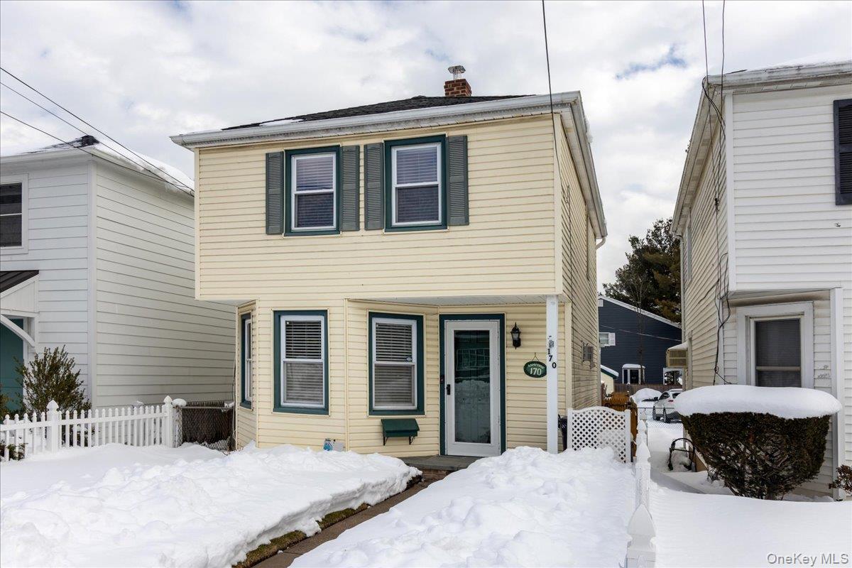 170 Birch Hill Road Locust Valley, NY 11560 - Photo 3 of 38 a front view of a house with a yard