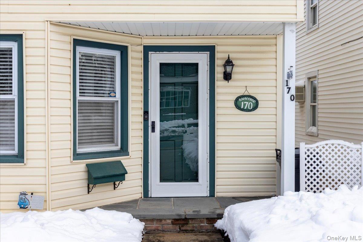 170 Birch Hill Road Locust Valley, NY 11560 - Photo 5 of 38 a front view of a house with a door