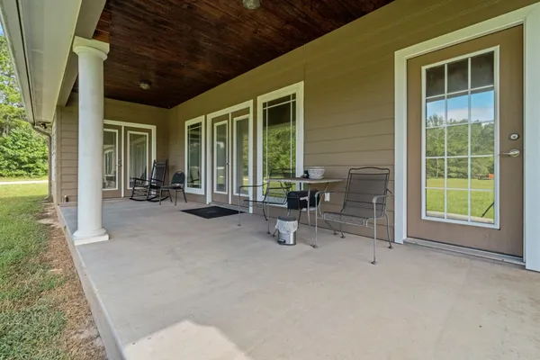 a view of living room with furniture and a yard
