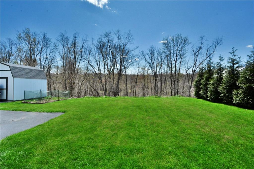 512 Blue Ridge Drive Coraopolis, PA 15108 - Photo 23 of 25 Another view of backyard - part of the property extends into the woods.