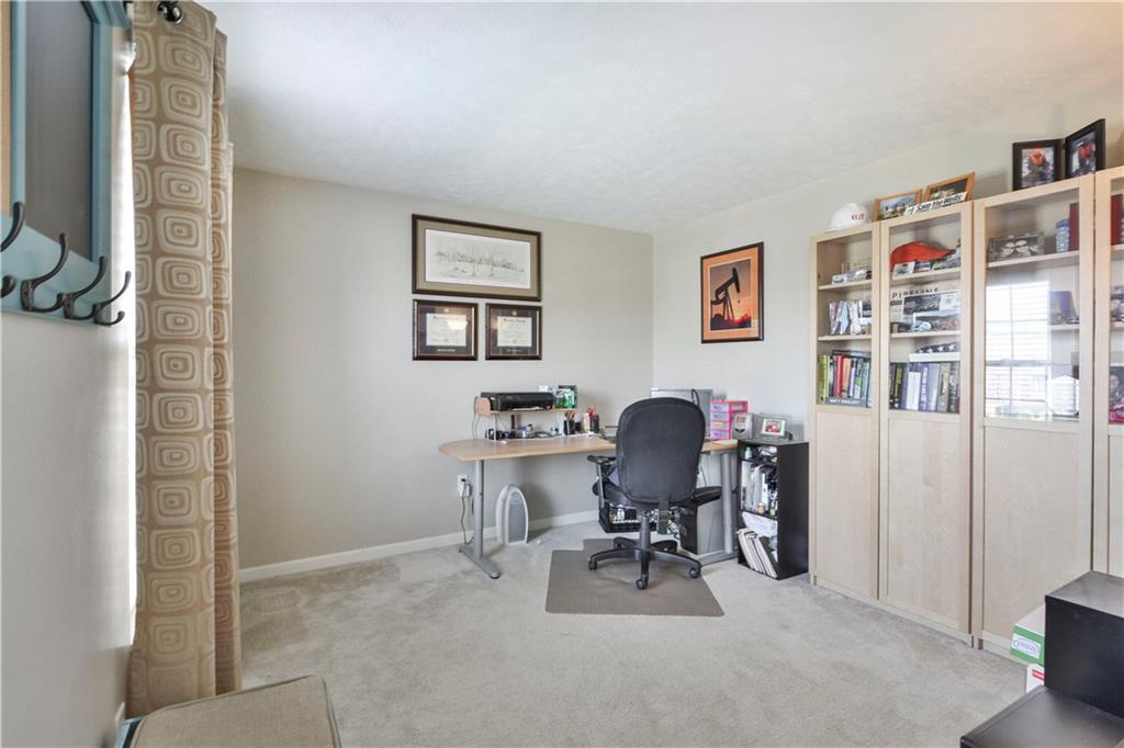 512 Blue Ridge Drive Coraopolis, PA 15108 - Photo 10 of 25 First Floor Formal Living Room - Currently being used as an office. Is the perfect flexspace for whatever your needs might be.
