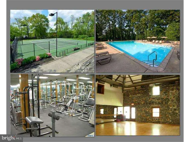 a view of an empty room with a fireplace