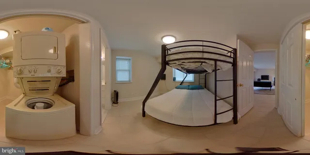 a view of a livingroom with furniture and a rug