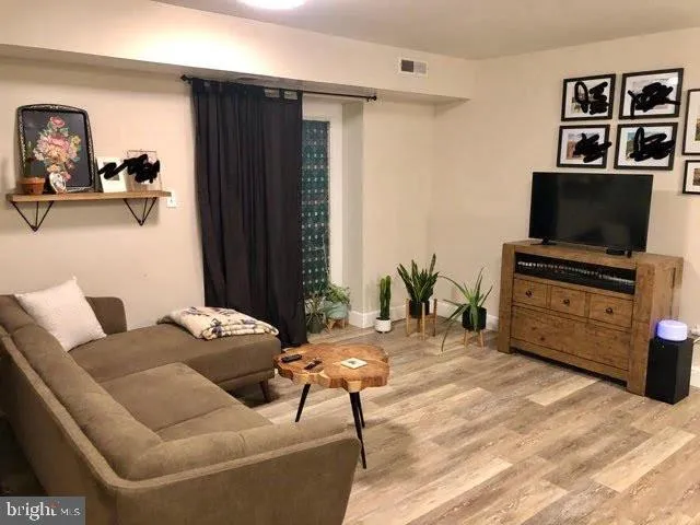 a large white bed in a white room