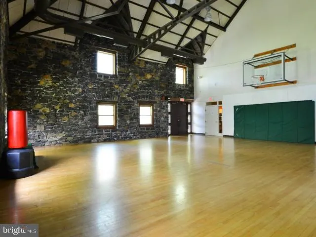 a large white bed in a white room