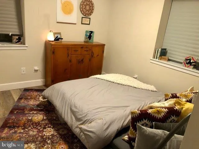 a kitchen with a sink appliances and cabinets