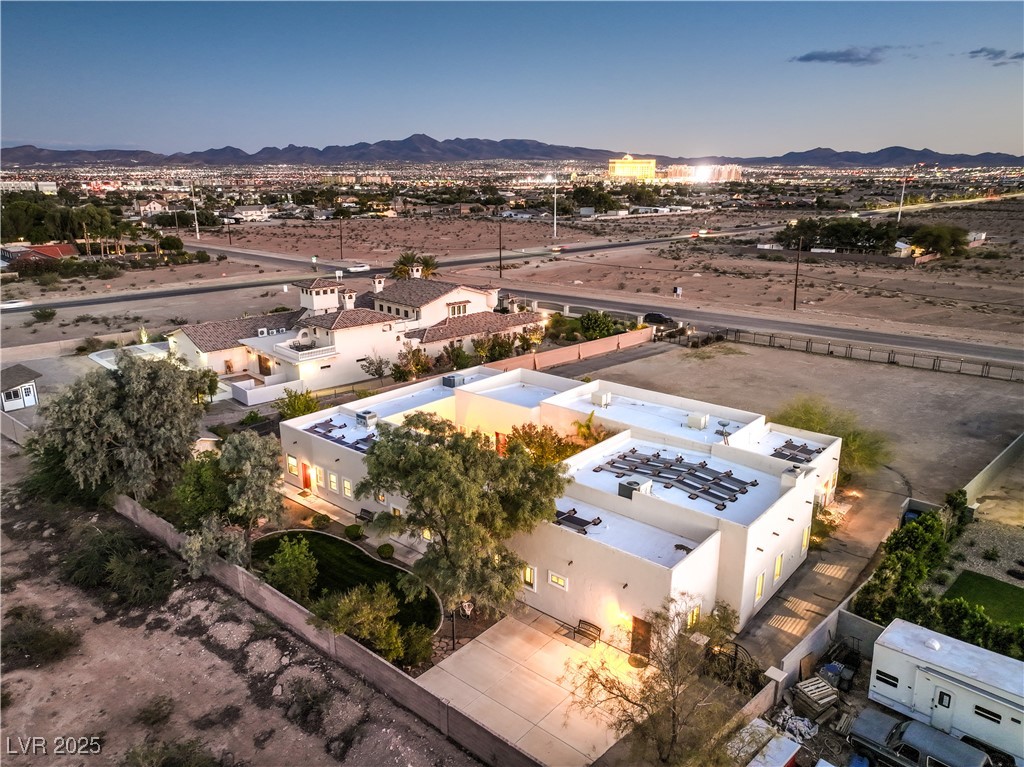 3910 West Pebble Road Las Vegas, NV 89139 - Photo 55 of 59 Drone / aerial view of a mountainous background
