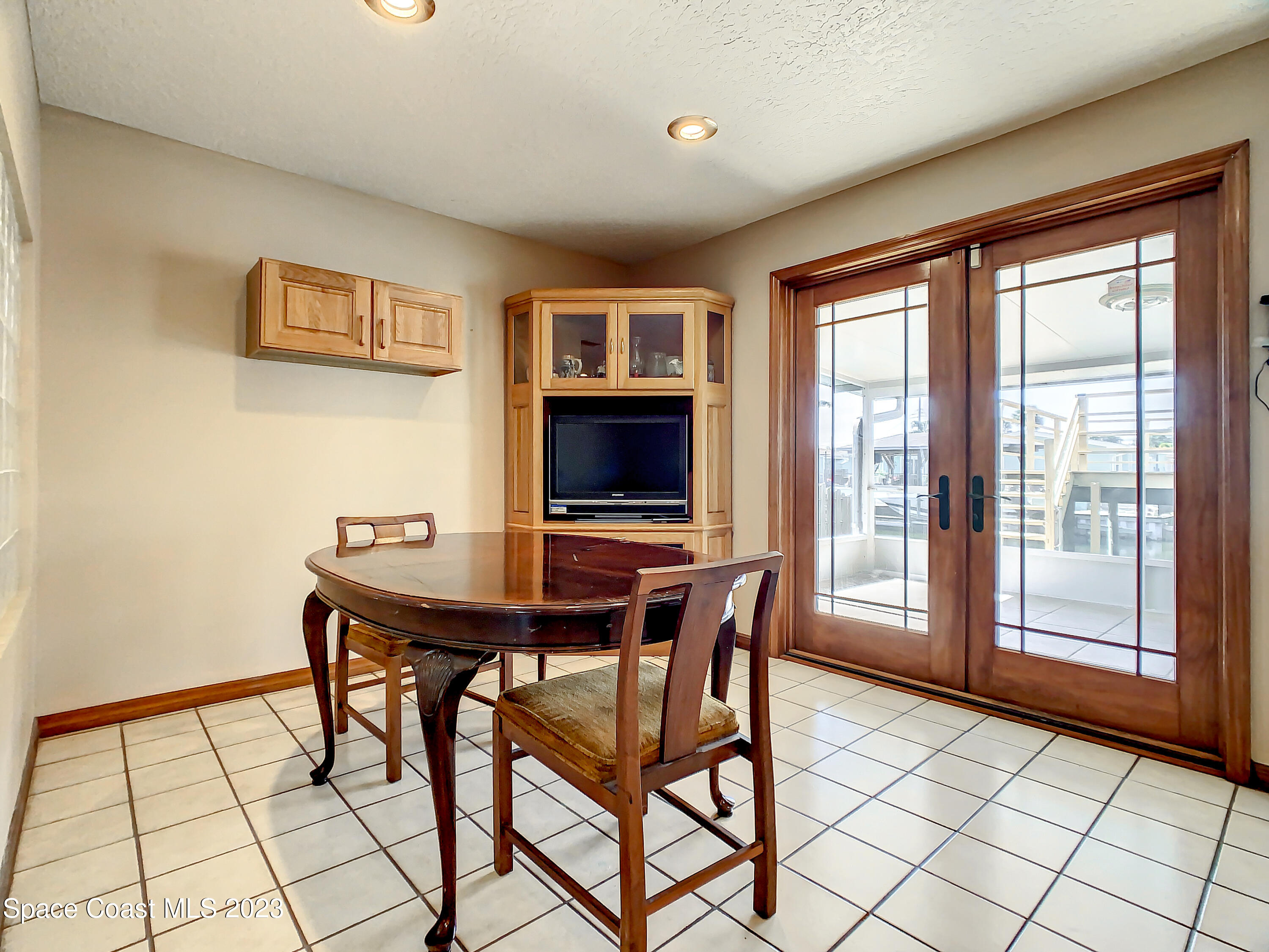 1675 East Riviera Drive Merritt Island, FL 32952 - Photo 19 of 50 a view of a livingroom with furniture and a window
