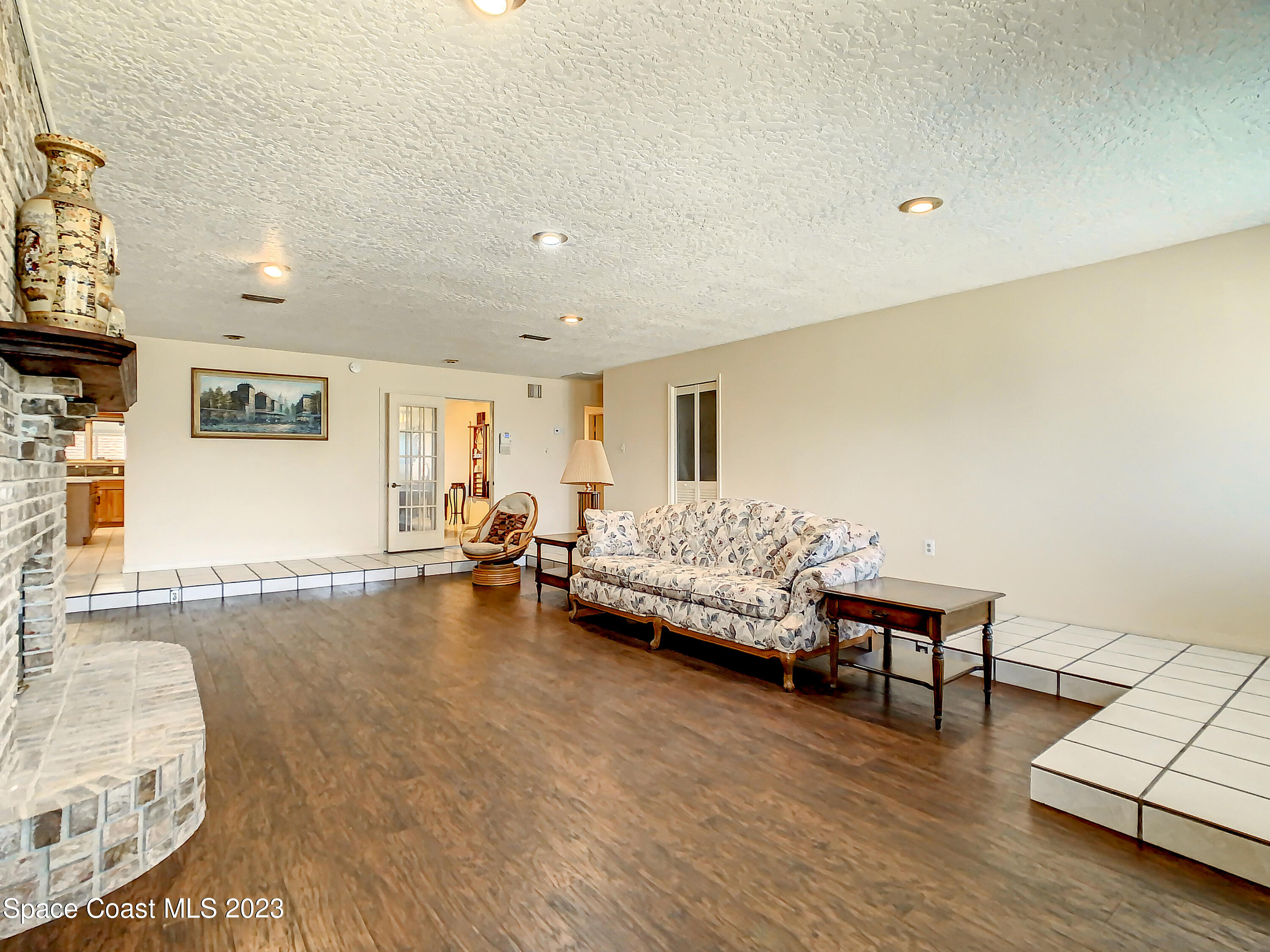 1675 East Riviera Drive Merritt Island, FL 32952 - Photo 9 of 50 a living room with furniture and a couch
