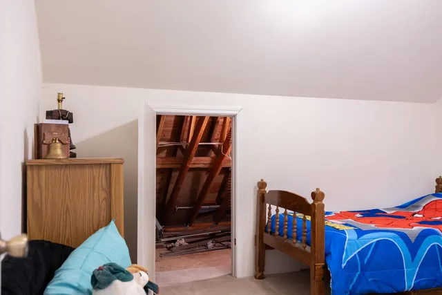 a view of a house with a tree