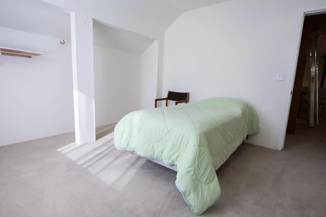 a view of a porch with wooden floor and outdoor space