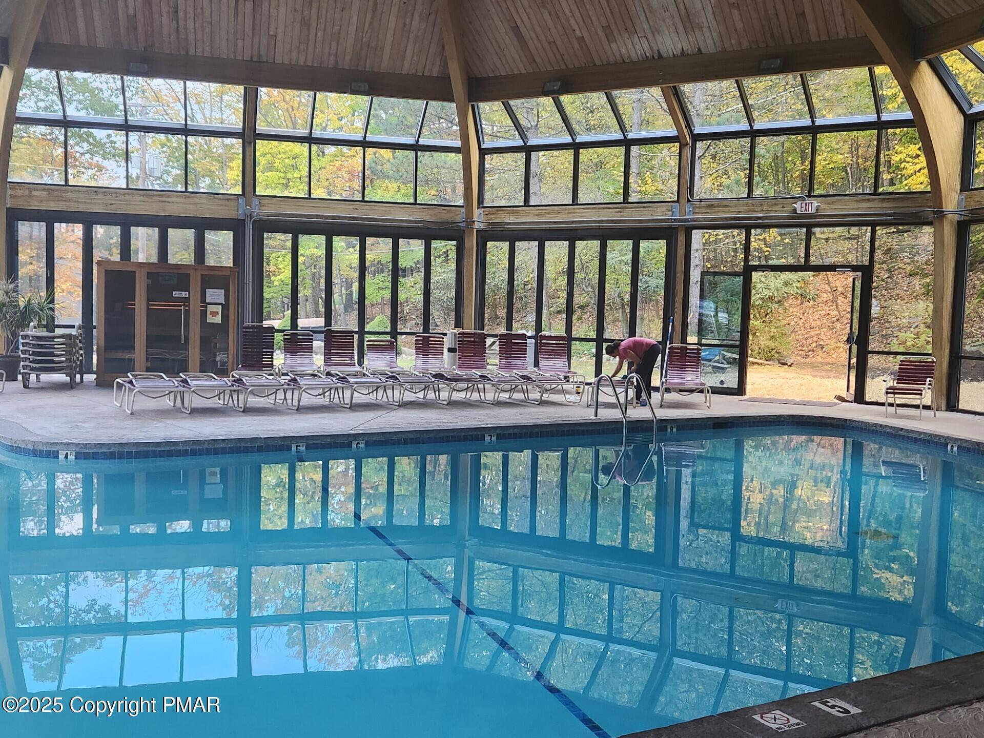 4 Middle Village Way Tannersville, PA 18372 - Photo 32 of 36 a view of a swimming pool with outdoor seating