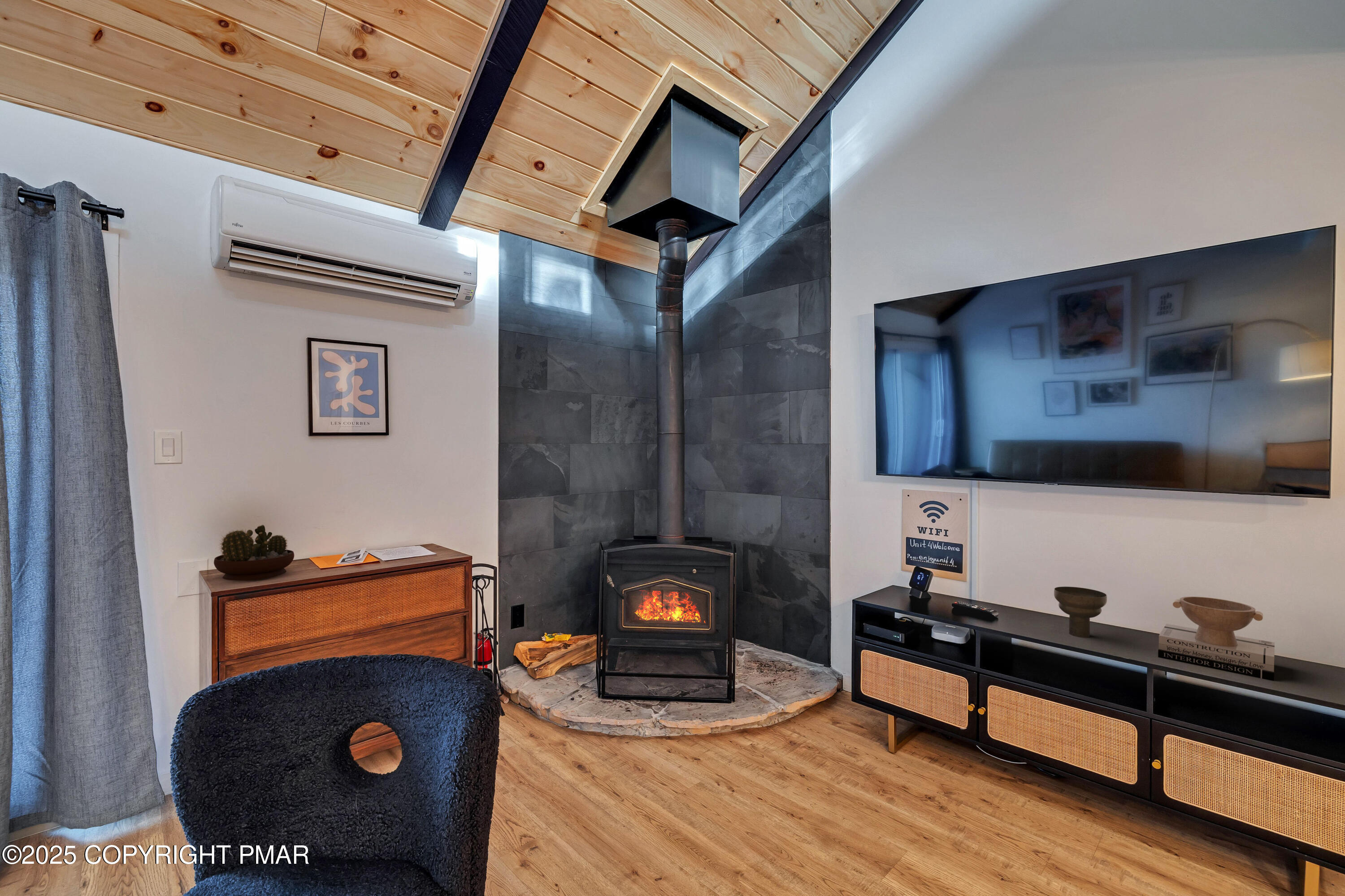 4 Middle Village Way Tannersville, PA 18372 - Photo 4 of 36 a living room with furniture and a fireplace