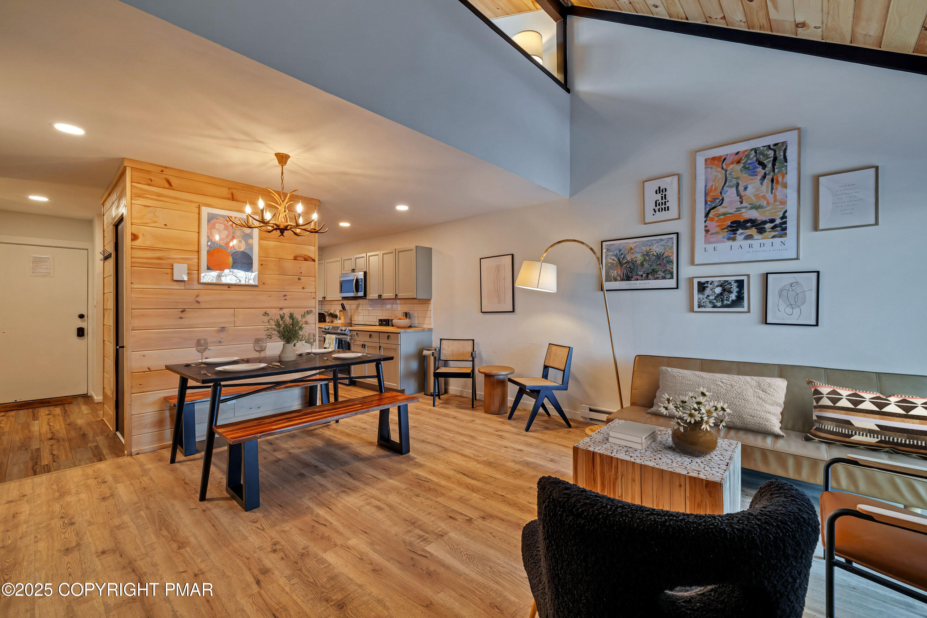 4 Middle Village Way Tannersville, PA 18372 - Photo 6 of 36 a living room with furniture and wooden floor