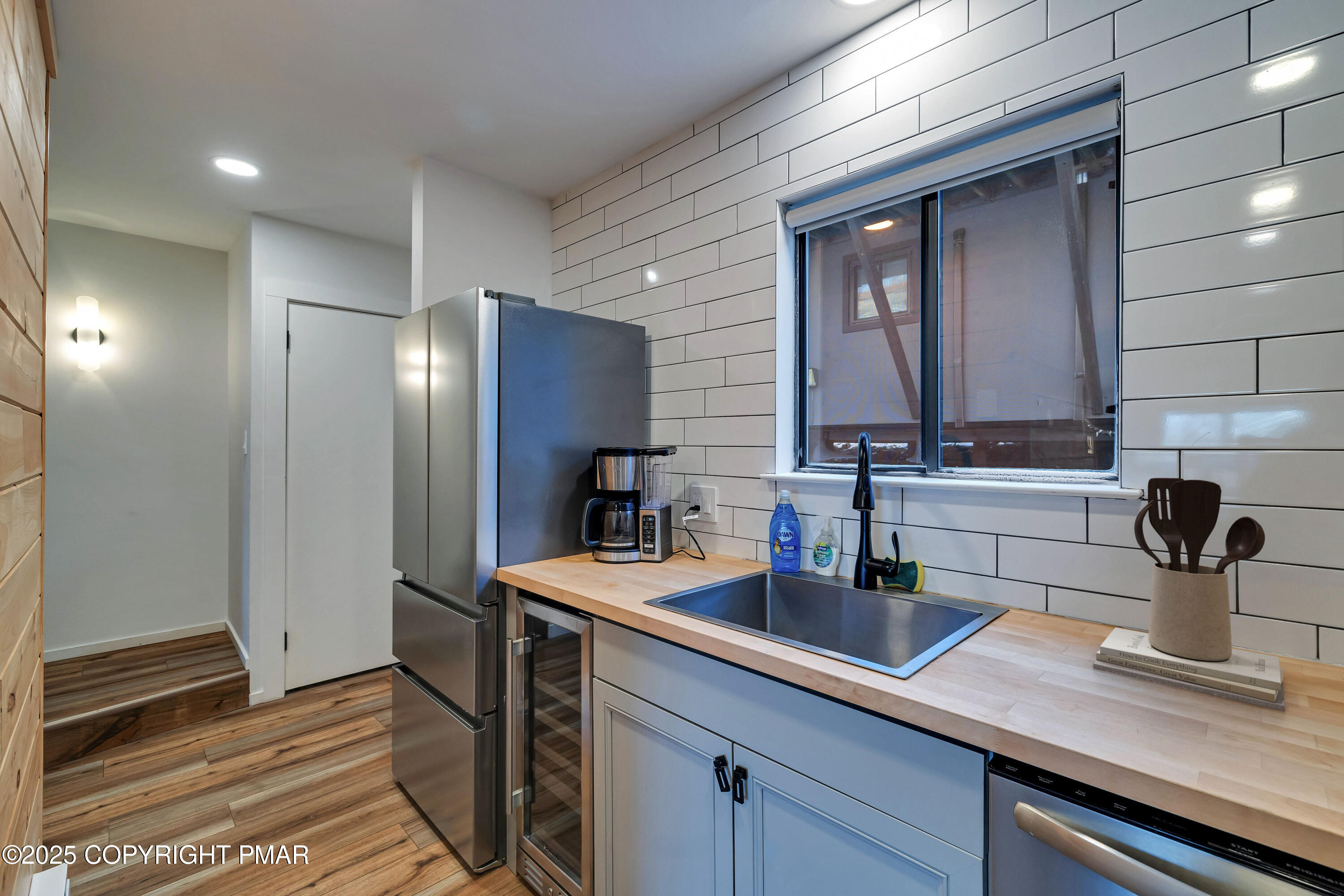 4 Middle Village Way Tannersville, PA 18372 - Photo 8 of 36 a kitchen with a sink and refrigerator