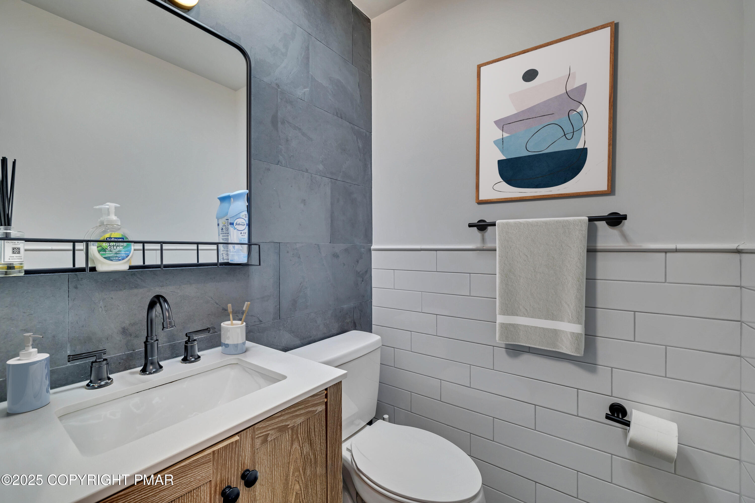 4 Middle Village Way Tannersville, PA 18372 - Photo 10 of 36 a bathroom with a sink a toilet and a mirror