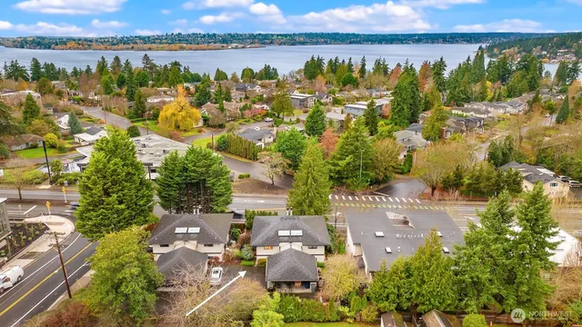 an aerial view of residential building with outdoor space and swimming pool