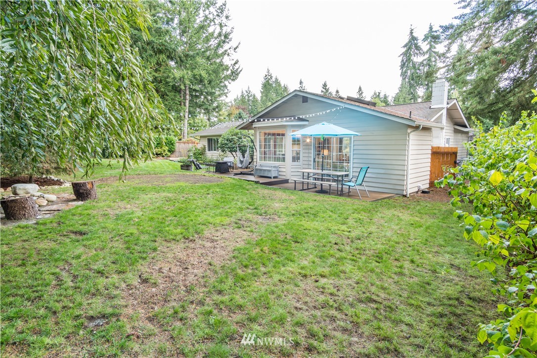 14634 Southeast 140th Street Renton, WA 98059 - Photo 23 of 35 a front view of a house with yard and green space