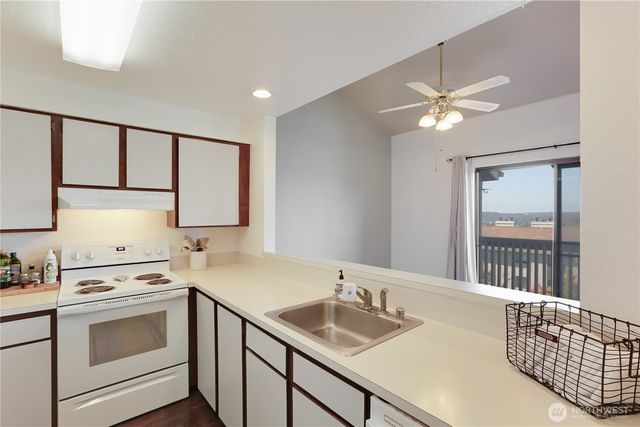 a bathroom with a sink a vanity and a mirror