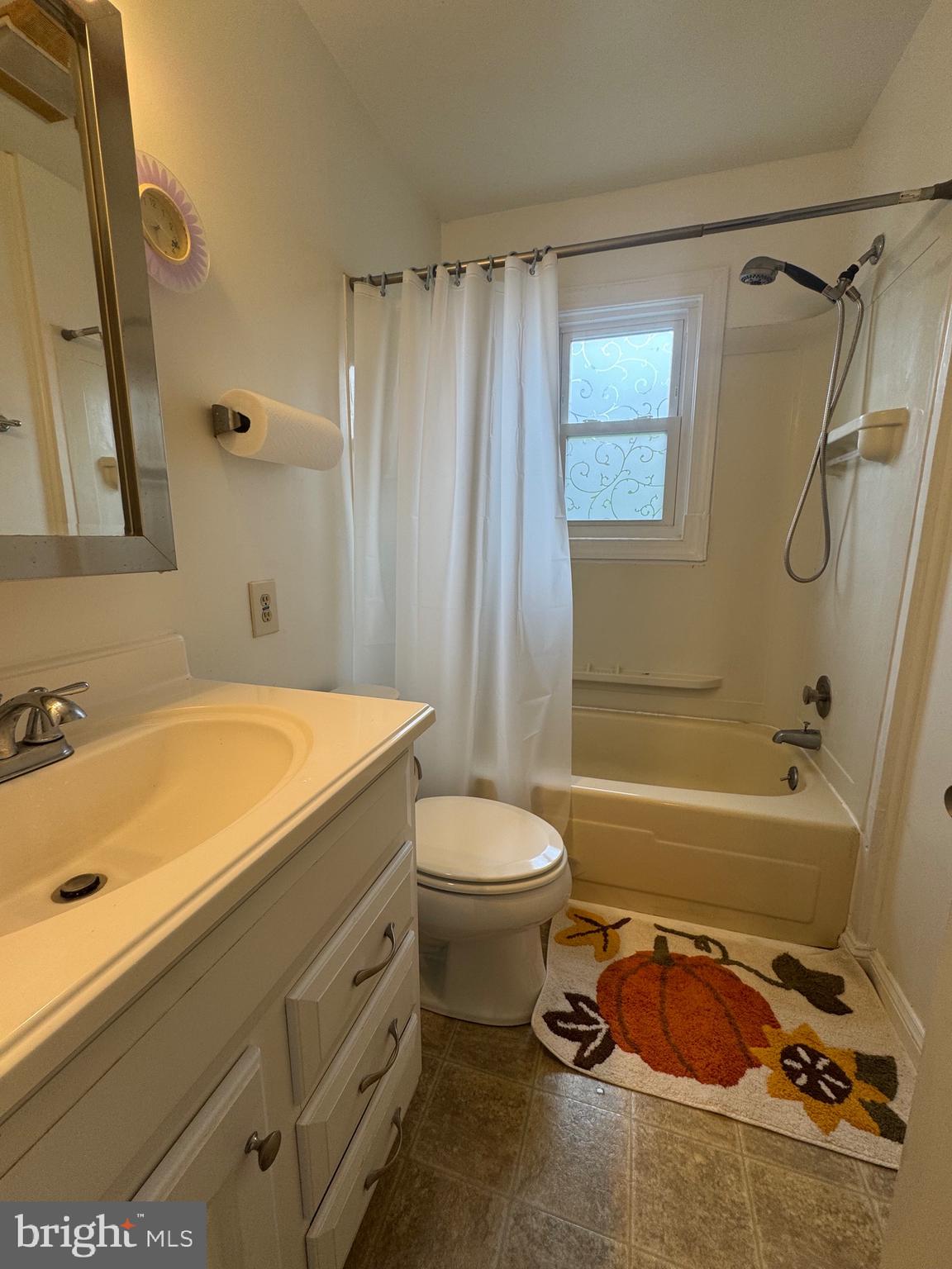 212 11th Street Laurel, MD 20707 - Photo 21 of 39 a bathroom with a sink a toilet and a bathtub
