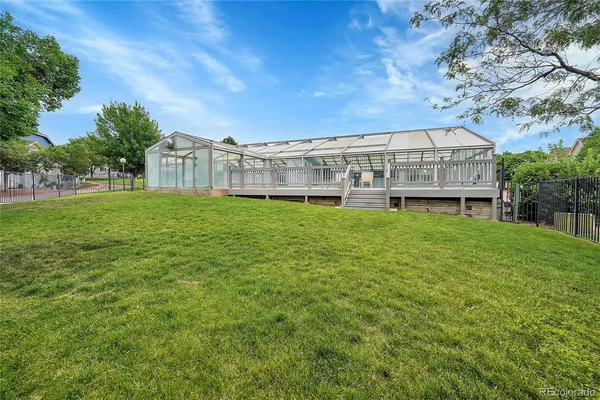 a view of a back yard of the house