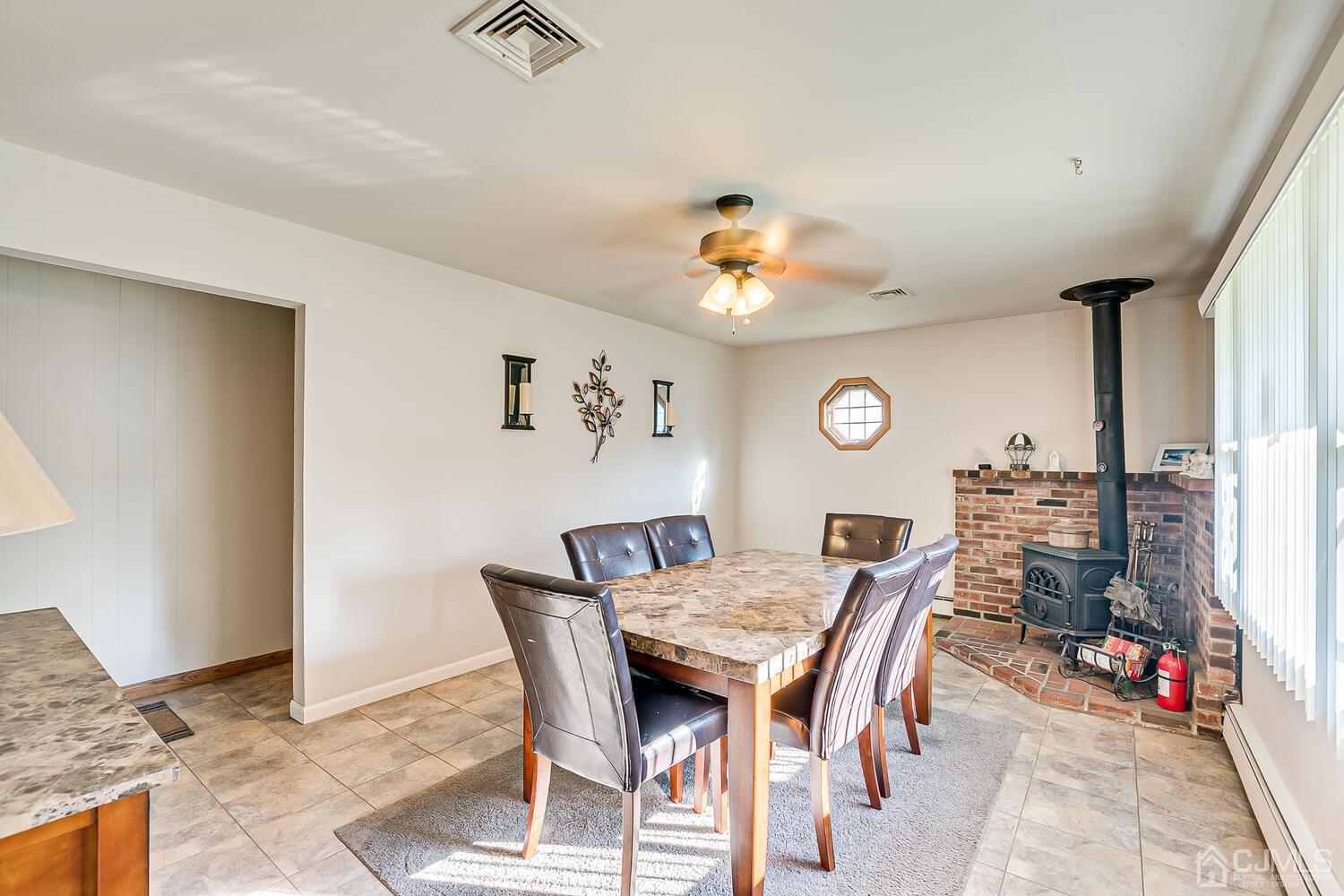 43 Kenmore Road Edison, NJ 08817 - Photo 2 of 19 a view of a dining room with furniture