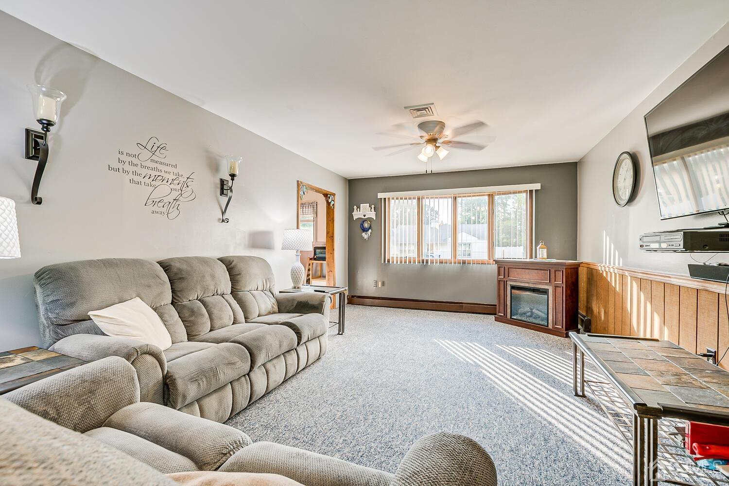 43 Kenmore Road Edison, NJ 08817 - Photo 5 of 19 a living room with furniture and a window