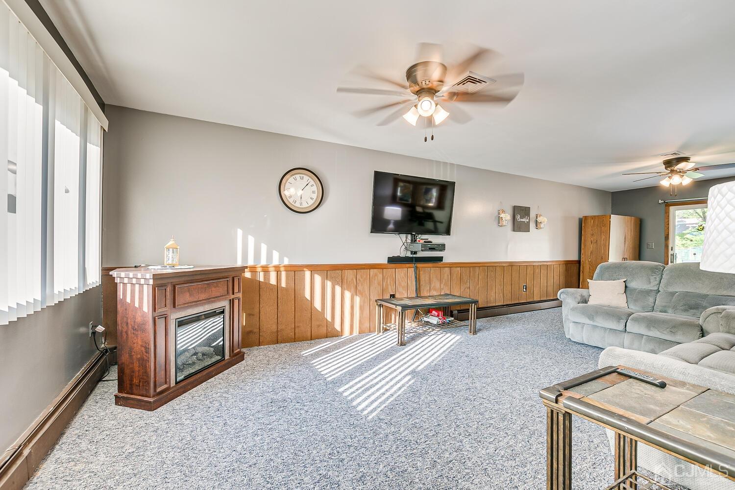 43 Kenmore Road Edison, NJ 08817 - Photo 6 of 19 a living room with furniture and a large window