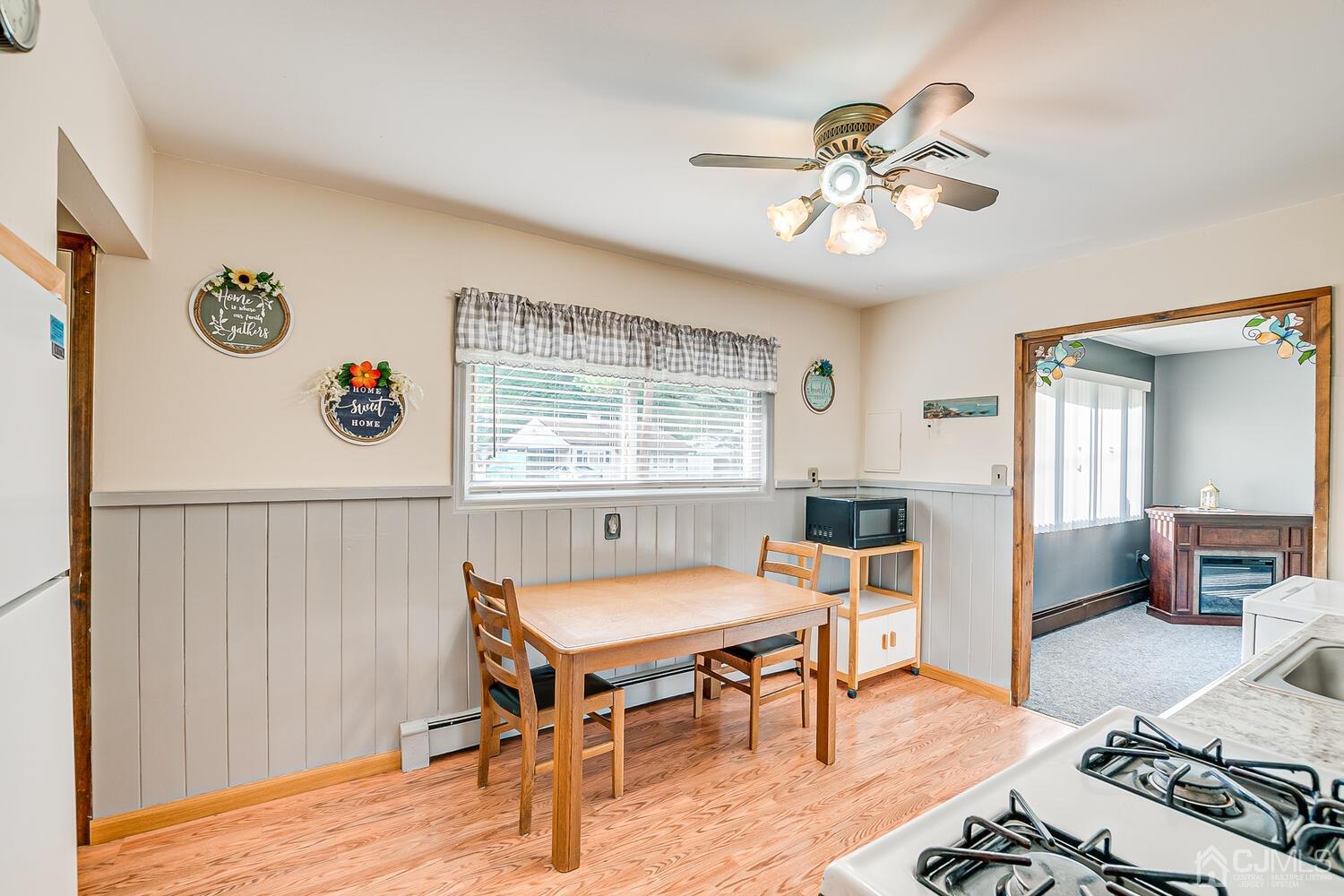 43 Kenmore Road Edison, NJ 08817 - Photo 9 of 19 a view of a dining room with furniture window and wooden floor