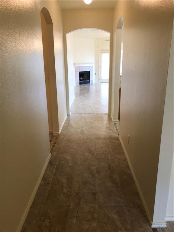 801 Ranchero Road Leander, TX 78641 - Photo 9 of 13 a view of a livingroom with a fireplace