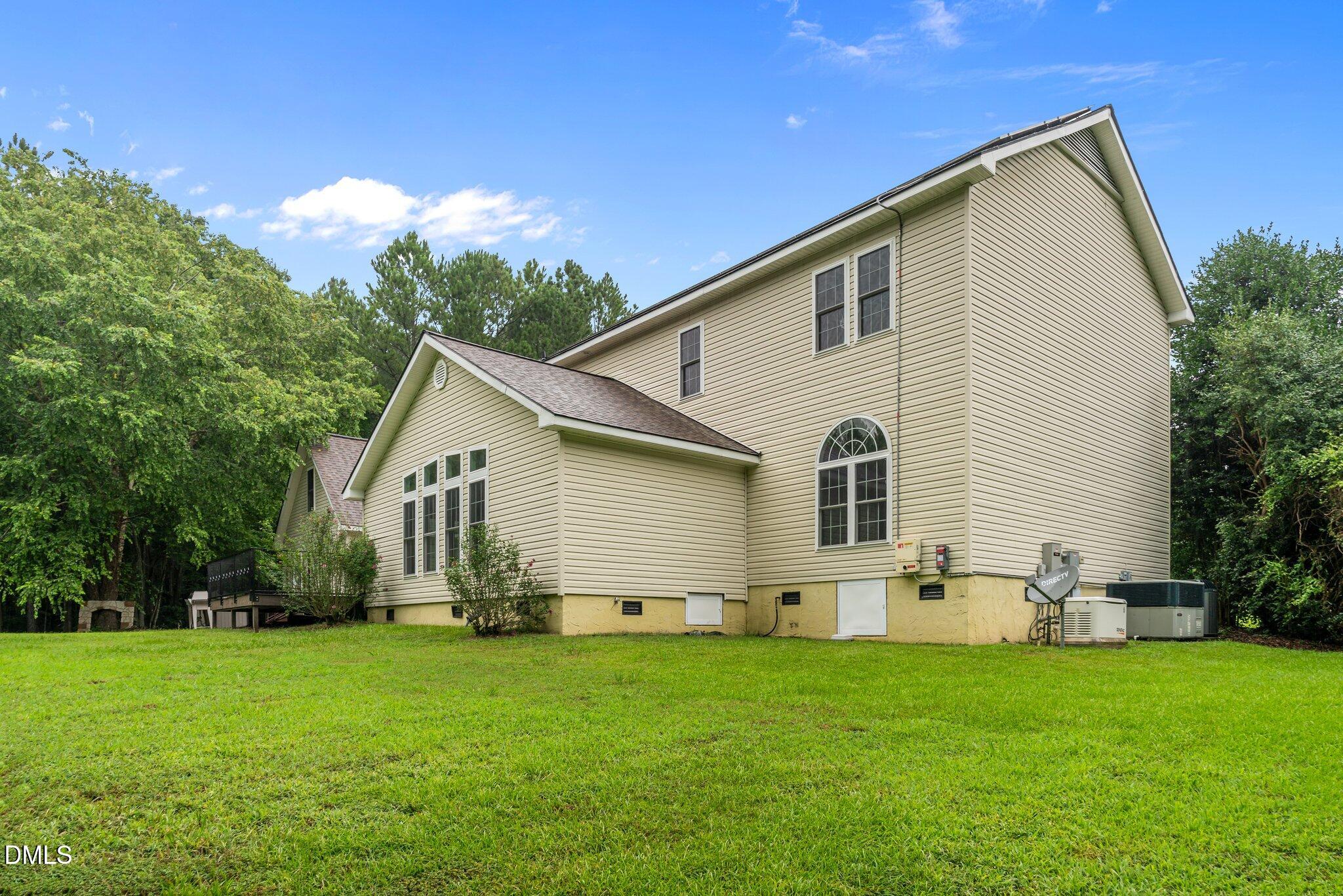 431 Patterson Ridge Lane Sanford, NC 27330 - Photo 23 of 29 a front view of house with yard and green space