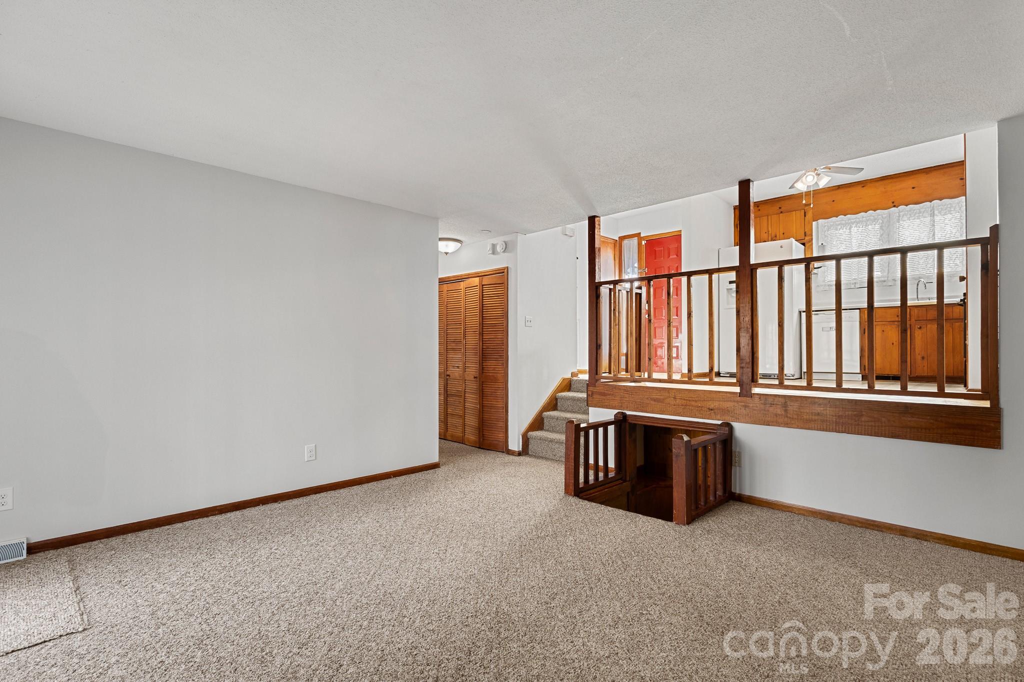 27077 Catamaran Drive Tega Cay, SC 29708 - Photo 12 of 28 an empty room with furniture and window