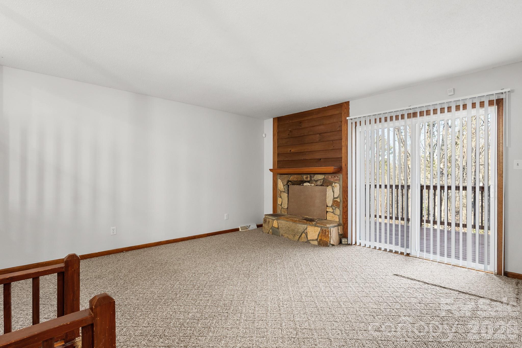 27077 Catamaran Drive Tega Cay, SC 29708 - Photo 5 of 28 a view of an empty room with a window