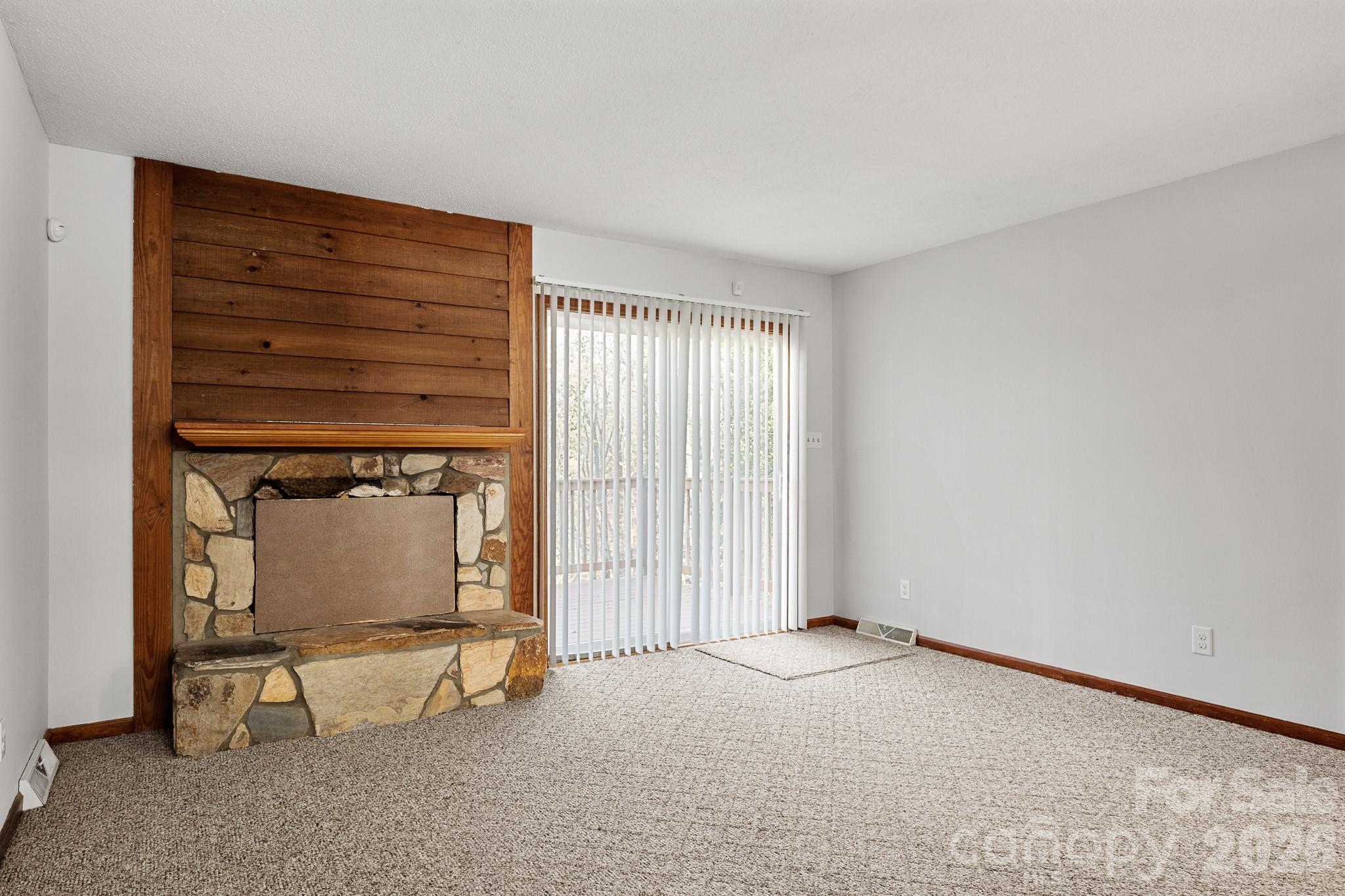 27077 Catamaran Drive Tega Cay, SC 29708 - Photo 6 of 28 an empty room with windows