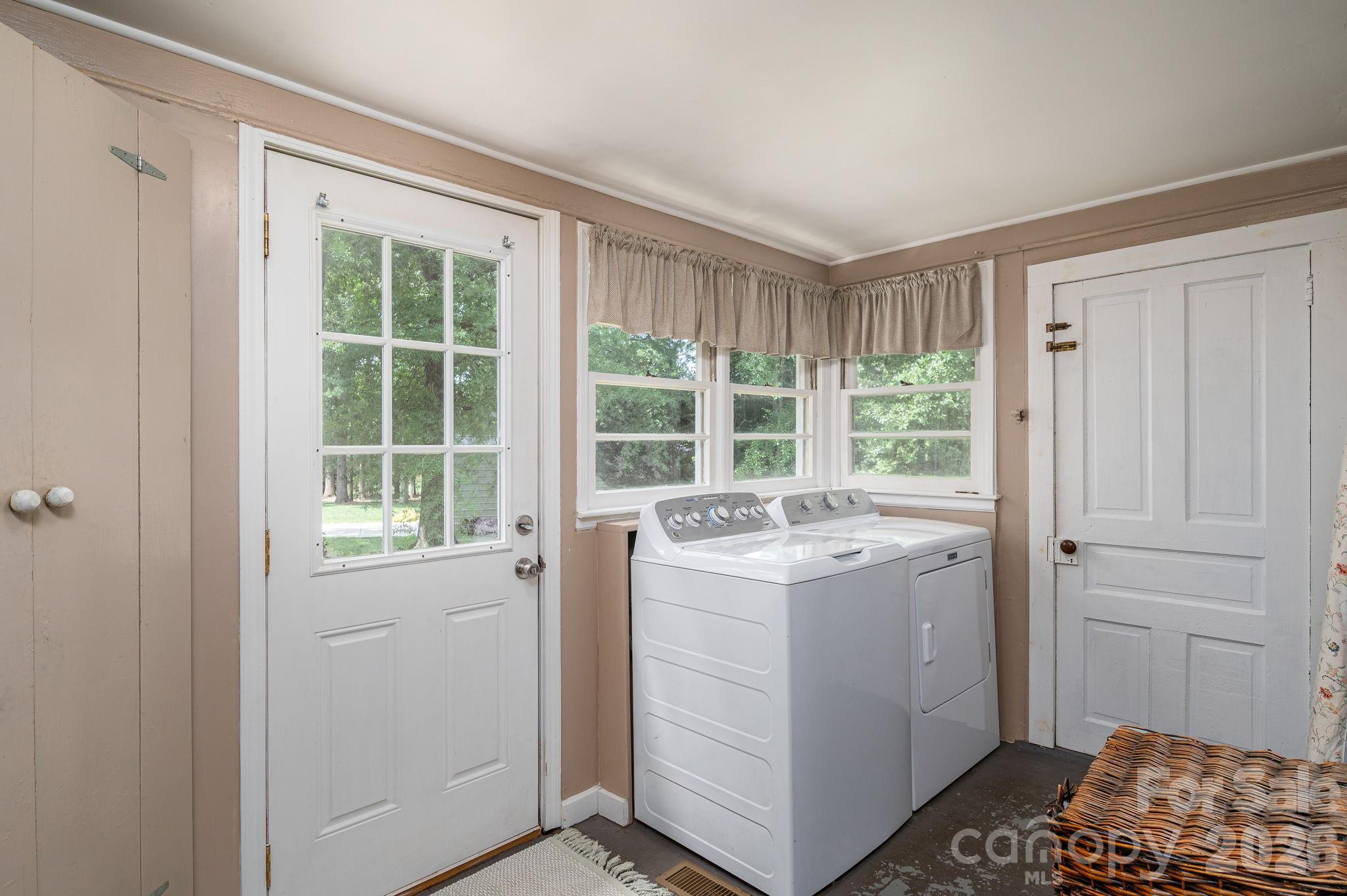 306 West Old Post Road Cherryville, NC 28021 - Photo 16 of 42 a view of hallway with window and kitchen view