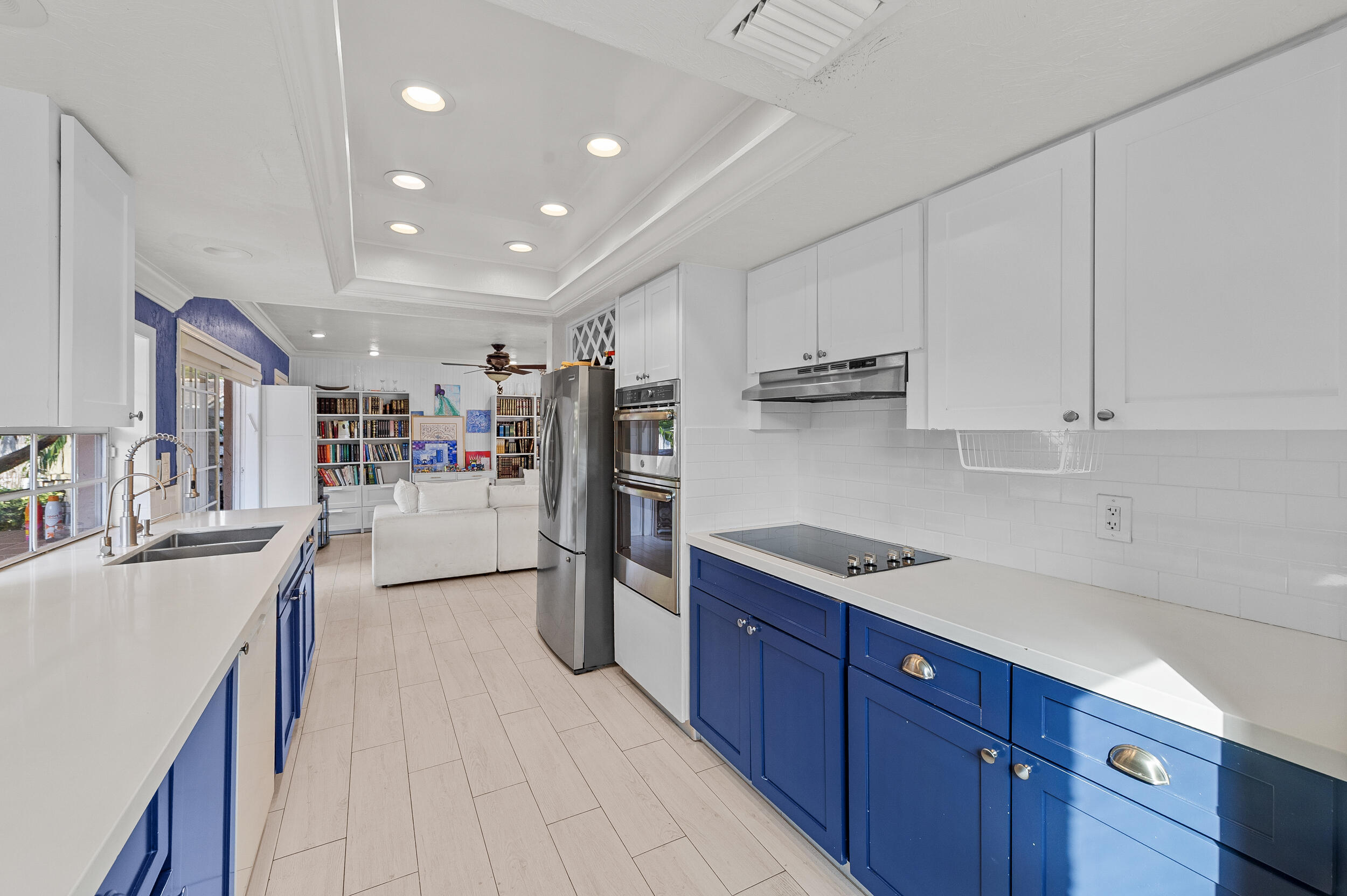 21089 Brookshire Terrace Boca Raton, FL 33433 - Photo 12 of 30 a kitchen with stainless steel appliances granite countertop a refrigerator and a stove top oven