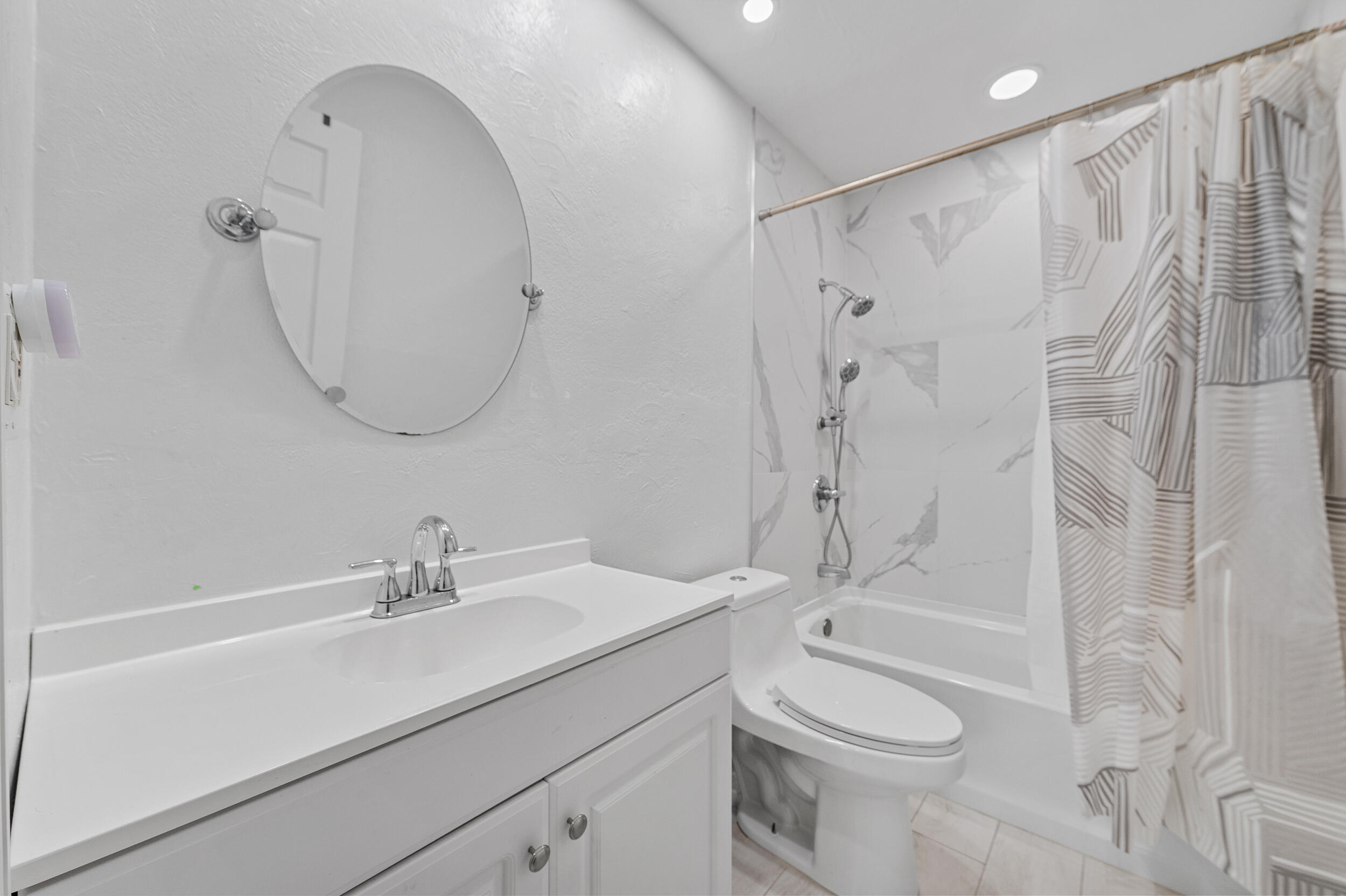 21089 Brookshire Terrace Boca Raton, FL 33433 - Photo 21 of 30 a bathroom with a sink a toilet and shower