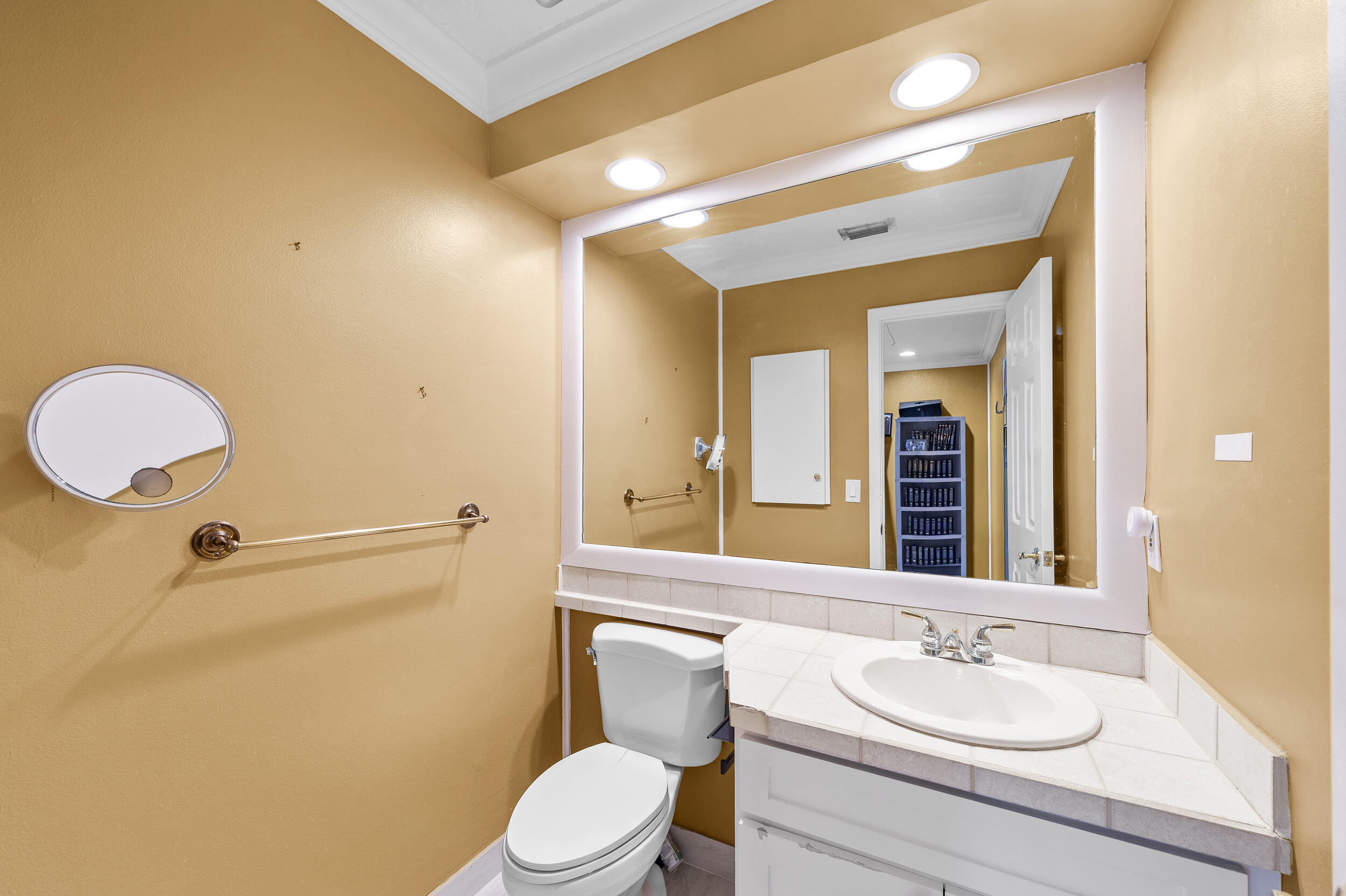 21089 Brookshire Terrace Boca Raton, FL 33433 - Photo 23 of 30 a bathroom with a granite countertop sink mirror vanity and toilet