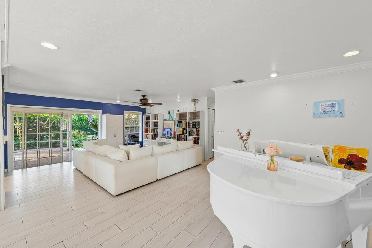 21089 Brookshire Terrace Boca Raton, FL 33433 - Photo 6 of 30 a living room with furniture and a table