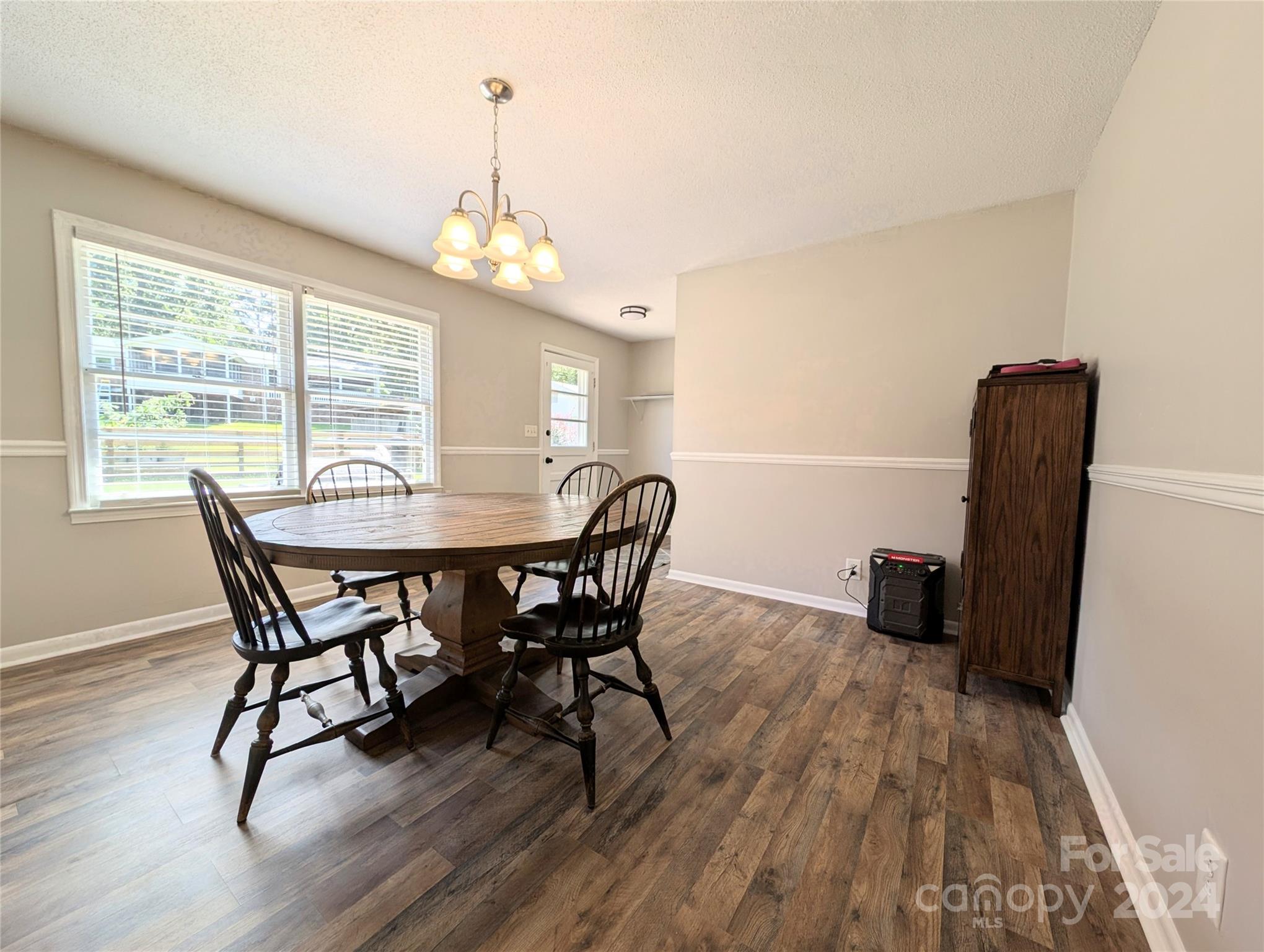 1285 Rainbow Circle Catawba, SC 29704 - Photo 11 of 23 a view of a dining room with furniture window and wooden floor