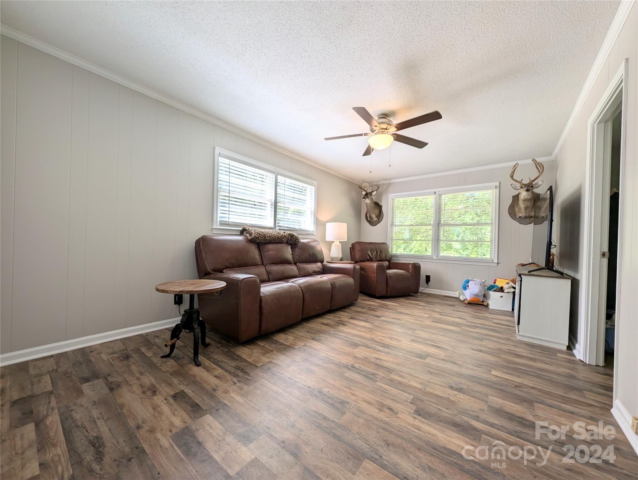 1285 Rainbow Circle Catawba, SC 29704 - Photo 13 of 23 a living room with furniture window and a wooden floor