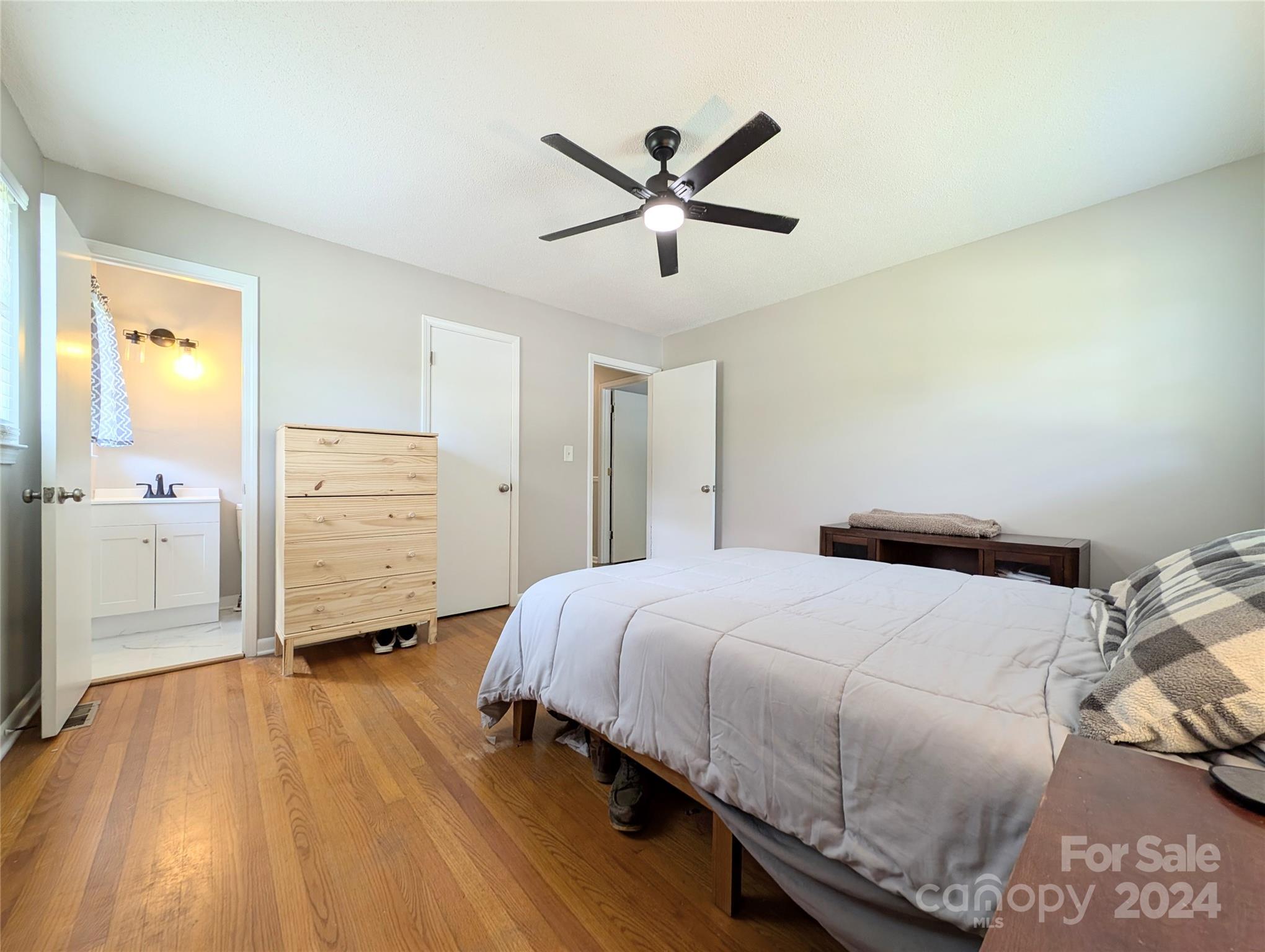1285 Rainbow Circle Catawba, SC 29704 - Photo 20 of 23 a bedroom with a bed and a ceiling fan