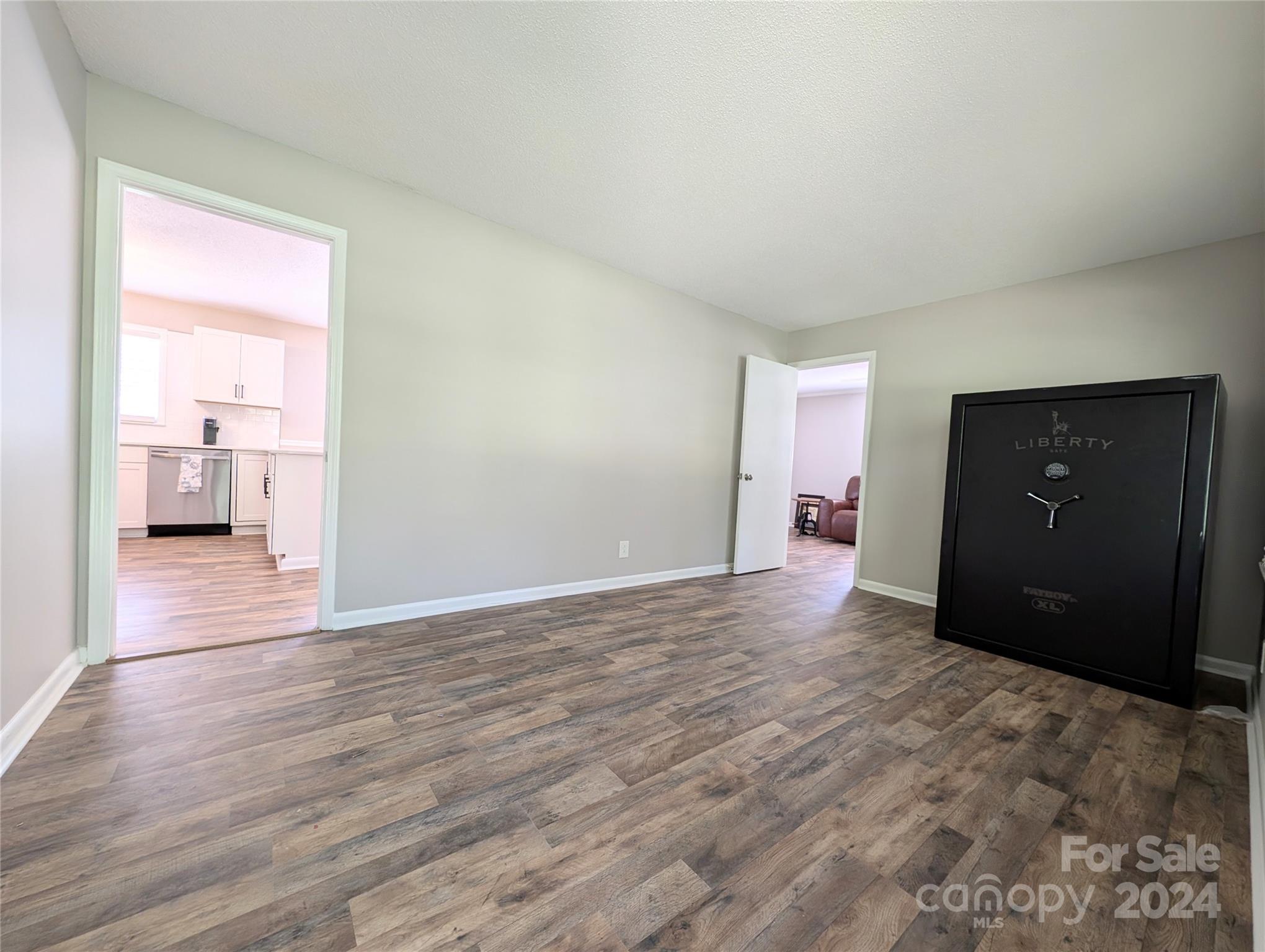 1285 Rainbow Circle Catawba, SC 29704 - Photo 4 of 23 a view of empty room with wooden floor