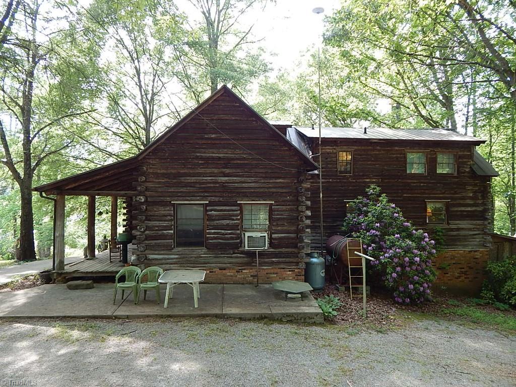 359 Hilton Road Stokesdale, NC 27357 - Photo 20 of 30 Exterior side view w/patio area