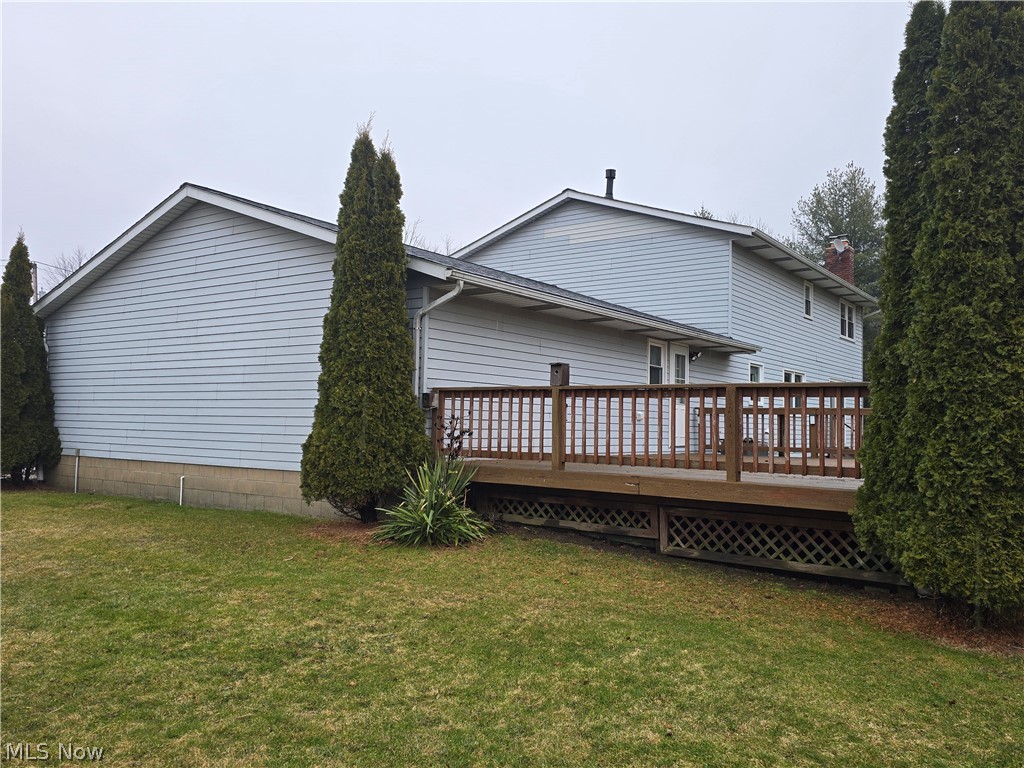2672 Crackel Road Aurora, OH 44202 - Photo 20 of 38 Rear view of property featuring a deck and a yard