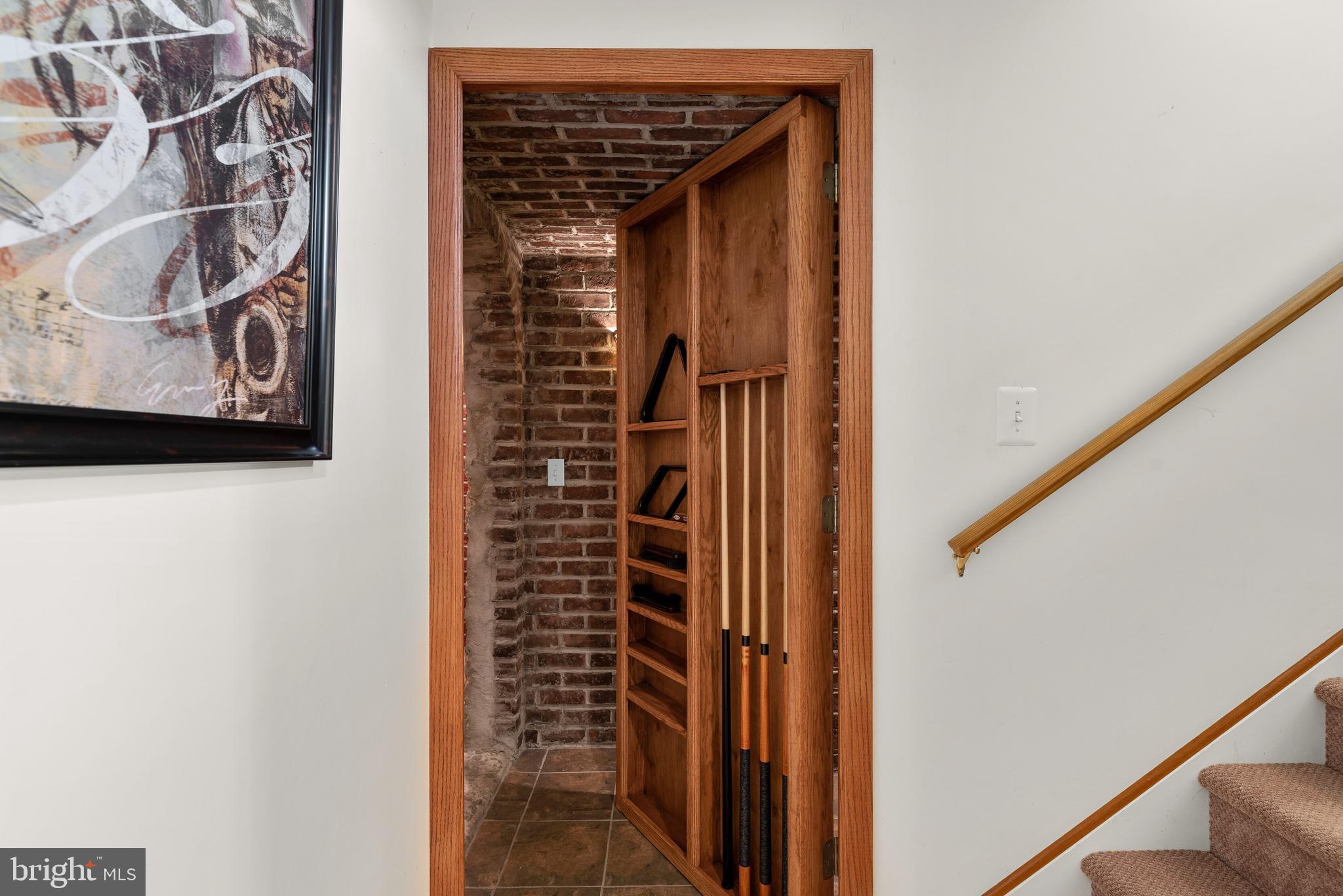 3913 Sharp Road Glenwood, MD 21738 - Photo 51 of 71 Secret Door to the Wine Cellar!