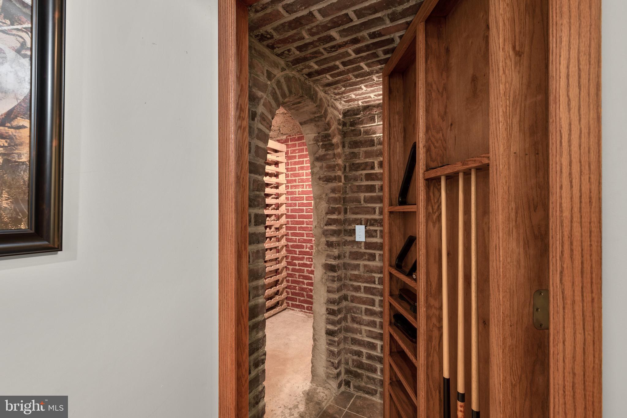 3913 Sharp Road Glenwood, MD 21738 - Photo 52 of 71 Secret Door to the Wine Cellar!