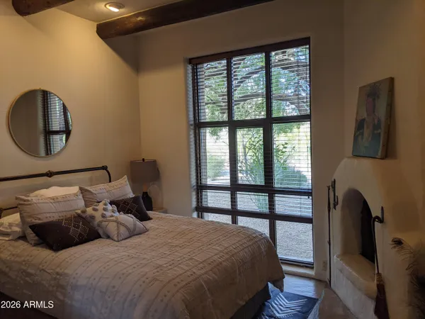 a living room with furniture rug and window
