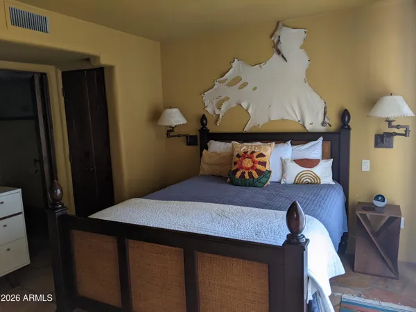 a hallway with two black and white walls